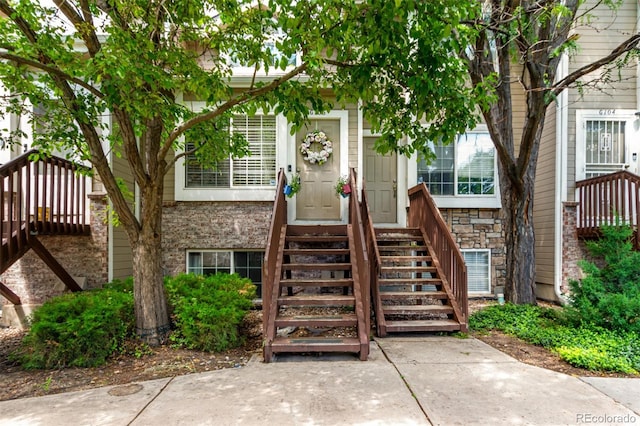 1885 S Quebec Way Unit G 106, Denver, CO 80231 - property entrance with stone siding and brick siding