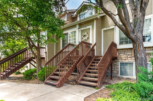 1885 S Quebec Way Unit G 106, Denver, CO 80231 - view of exterior entry featuring stone siding