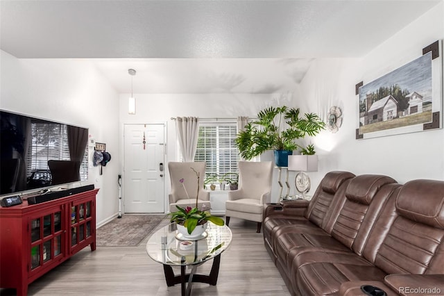 1885 S Quebec Way Unit G 106, Denver, CO 80231 - living area with wood finished floors and baseboards