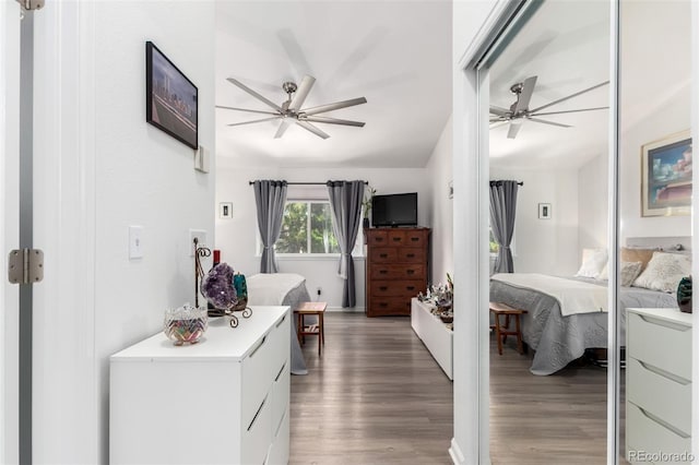 1885 S Quebec Way Unit G 106, Denver, CO 80231 - bedroom featuring light wood-style flooring, lofted ceiling, and a ceiling fan