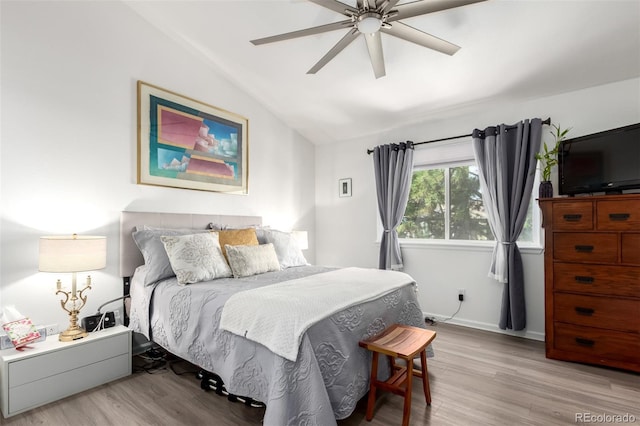 1885 S Quebec Way Unit G 106, Denver, CO 80231 - bedroom with vaulted ceiling, light wood-style floors, and a ceiling fan