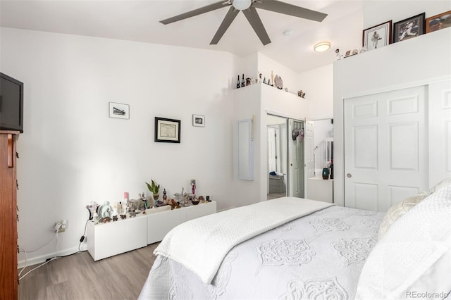 1885 S Quebec Way Unit G 106, Denver, CO 80231 - bedroom featuring light wood-type flooring, a closet, and a ceiling fan