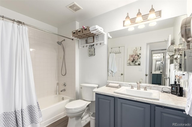 1885 S Quebec Way Unit G 106, Denver, CO 80231 - bathroom with vanity, shower / bath combo, and wood finished floors