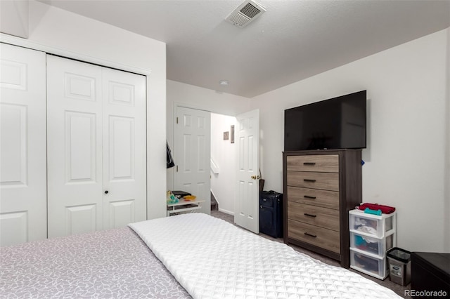 1885 S Quebec Way Unit G 106, Denver, CO 80231 - carpeted bedroom with a closet