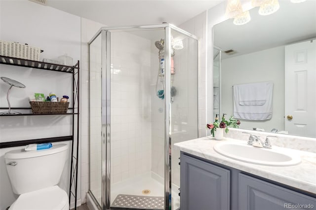 1885 S Quebec Way Unit G 106, Denver, CO 80231 - full bathroom featuring vanity and a shower stall