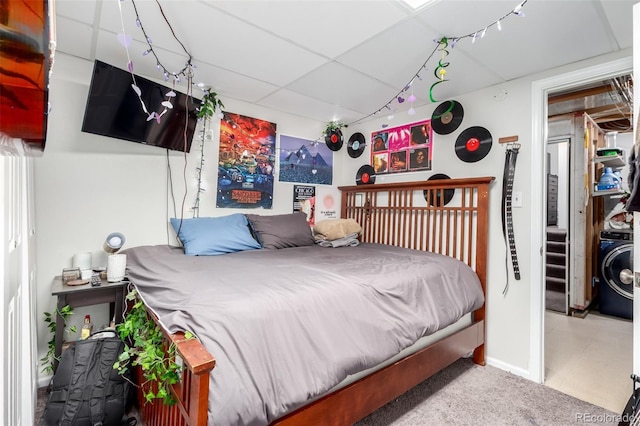 1885 S Quebec Way Unit G 106, Denver, CO 80231 - bedroom with washer / dryer and baseboards