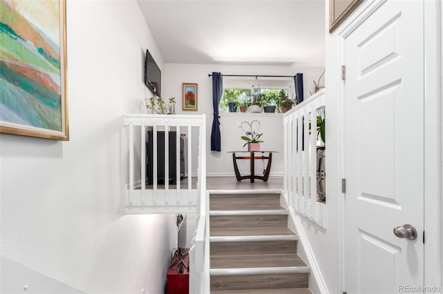 1885 S Quebec Way Unit G 106, Denver, CO 80231 - staircase with wood finished floors and baseboards