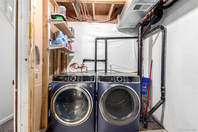 1885 S Quebec Way Unit G 106, Denver, CO 80231 - laundry room featuring independent washer and dryer