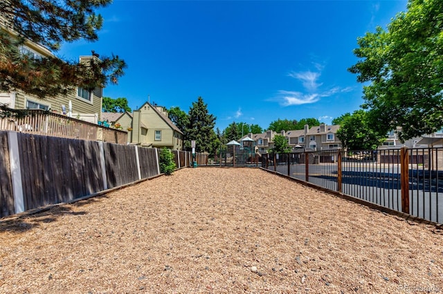 1885 S Quebec Way Unit G 106, Denver, CO 80231 - view of yard featuring a residential view