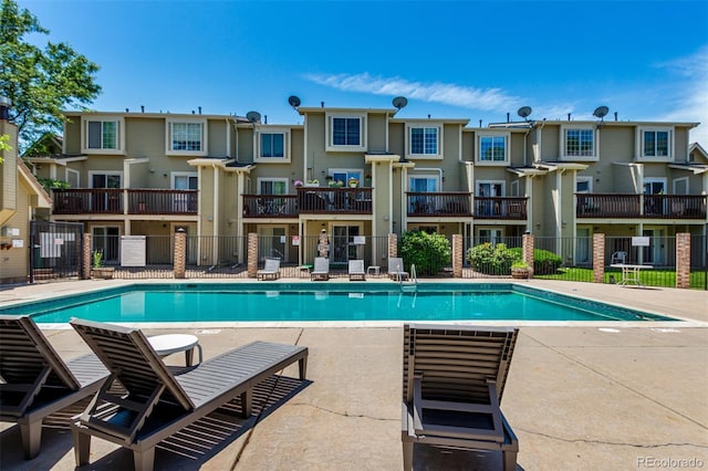 1885 S Quebec Way Unit G 106, Denver, CO 80231 - community pool featuring a residential view and a patio area