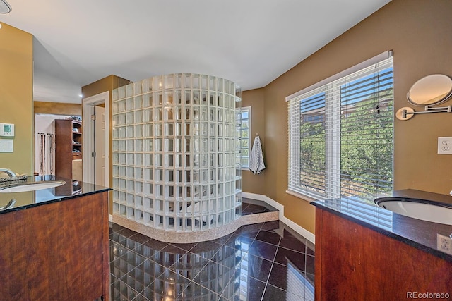 bathroom with vanity and tile patterned floors