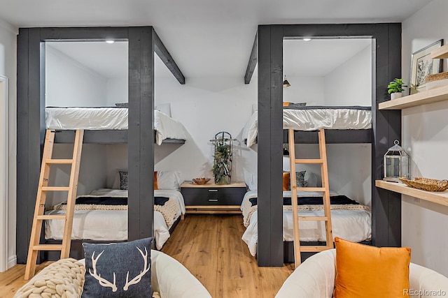 bedroom with wood finished floors