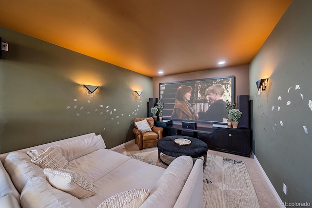 home theater room with light carpet, recessed lighting, and baseboards