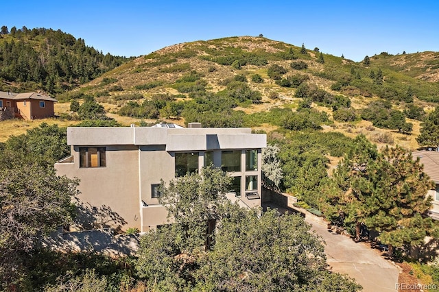 exterior space featuring a mountain view