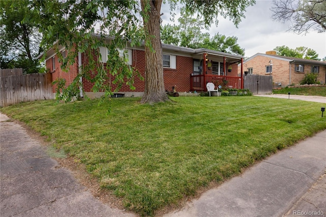 11861 Claude Way, Northglenn, CO 80233 - view of front facade featuring brick siding and a porch