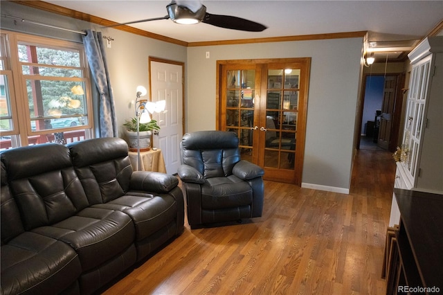 11861 Claude Way, Northglenn, CO 80233 - living area featuring ceiling fan, ornamental molding, and wood finished floors