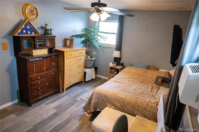 11861 Claude Way, Northglenn, CO 80233 - bedroom featuring wood finished floors and a textured ceiling