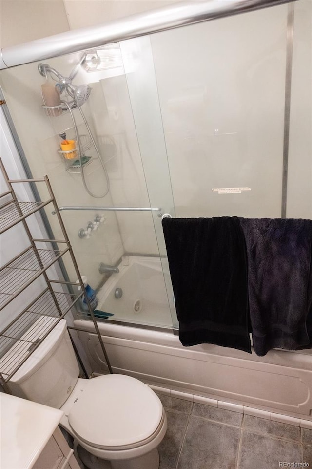 11861 Claude Way, Northglenn, CO 80233 - full bath with shower / bath combination with glass door and tile patterned floors
