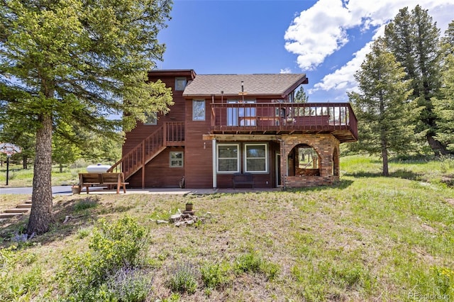 173 Silver Cloud Ln, Boulder, CO 80302 - rear view of property featuring a deck and stairway