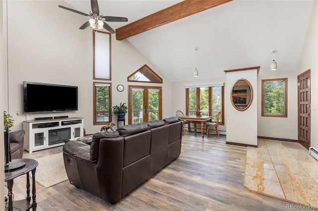 173 Silver Cloud Ln, Boulder, CO 80302 - living room with high vaulted ceiling, a ceiling fan, beamed ceiling, a baseboard radiator, and wood finished floors
