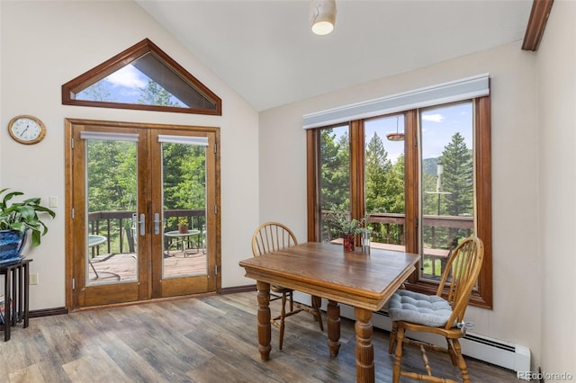 173 Silver Cloud Ln, Boulder, CO 80302 - dining space with lofted ceiling, plenty of natural light, french doors, and wood finished floors