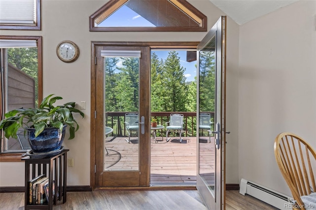 173 Silver Cloud Ln, Boulder, CO 80302 - entryway with a baseboard heating unit, wood finished floors, and plenty of natural light