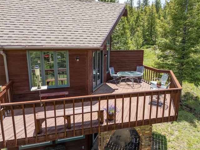 173 Silver Cloud Ln, Boulder, CO 80302 - wooden terrace with outdoor dining space