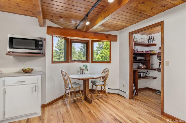 173 Silver Cloud Ln, Boulder, CO 80302 - dining area featuring a wooden ceiling with exposed beams, light wood-style floors, a baseboard heating unit, and rail lighting