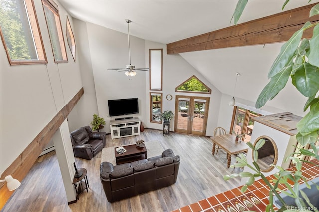 173 Silver Cloud Ln, Boulder, CO 80302 - living area featuring wood finished floors, beamed ceiling, high vaulted ceiling, french doors, and a ceiling fan