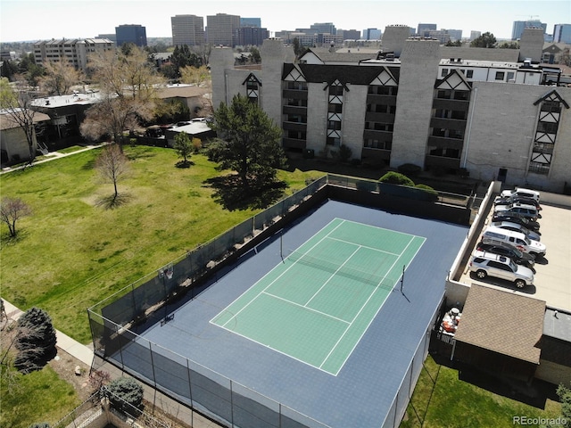 4250 S Olive St Unit 102, Denver, CO 80237 - view of sport court featuring a lawn and fence