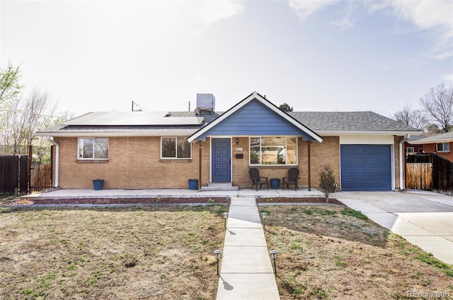8651 Franklin St, Denver, CO 80229 - single story home featuring a garage, fence, concrete driveway, and brick siding