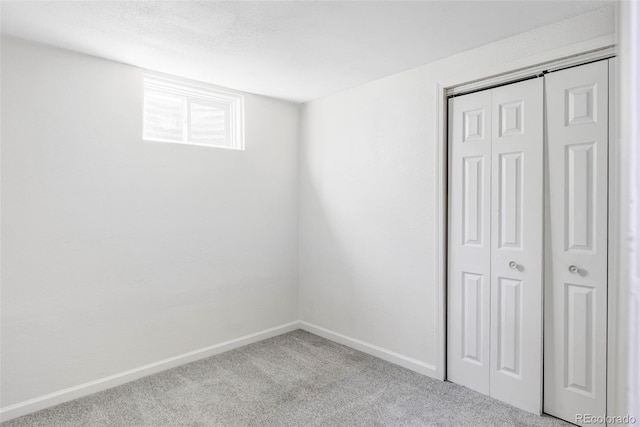 8651 Franklin St, Denver, CO 80229 - unfurnished bedroom with a closet, baseboards, and carpet