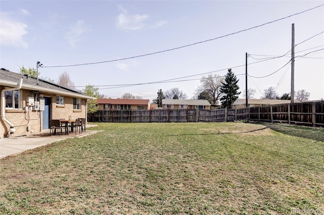 8651 Franklin St, Denver, CO 80229 - view of yard featuring a fenced backyard and a patio