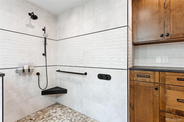 5859 E Ida Pl, Greenwood Village, CO 80111 - full bathroom featuring a tile shower