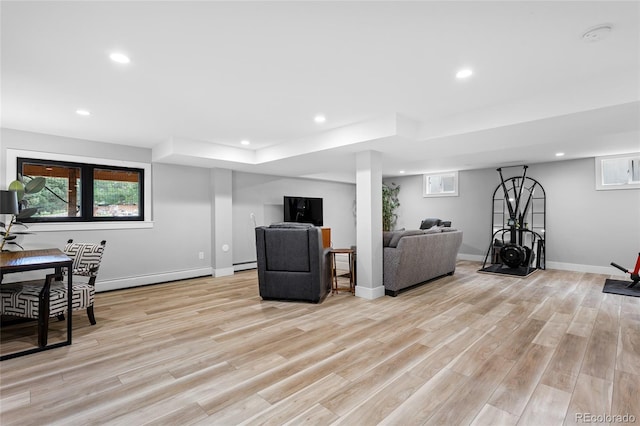 5859 E Ida Pl, Greenwood Village, CO 80111 - living room with recessed lighting, baseboards, light wood-type flooring, a wealth of natural light, and a baseboard radiator