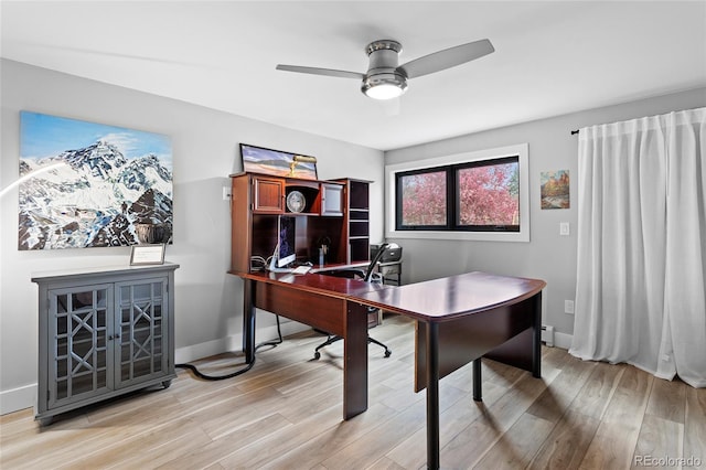 5859 E Ida Pl, Greenwood Village, CO 80111 - home office featuring baseboards, a ceiling fan, and light wood-style flooring