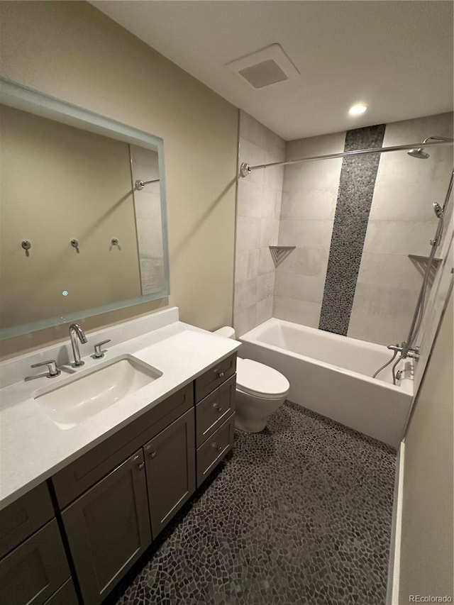 5859 E Ida Pl, Greenwood Village, CO 80111 - bathroom with toilet, recessed lighting, tub / shower combination, and vanity