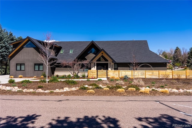 5859 E Ida Pl, Greenwood Village, CO 80111 - view of front of home featuring stucco siding and fence private yard