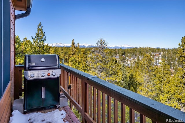 balcony with a mountain view and grilling area