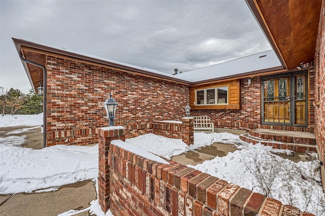 view of snow covered patio