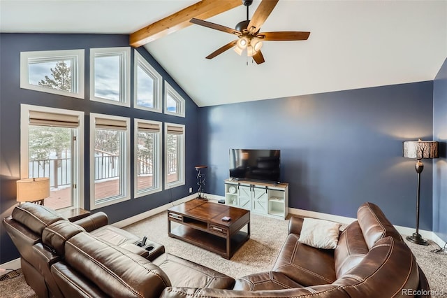 living room with ceiling fan, a healthy amount of sunlight, beam ceiling, and high vaulted ceiling