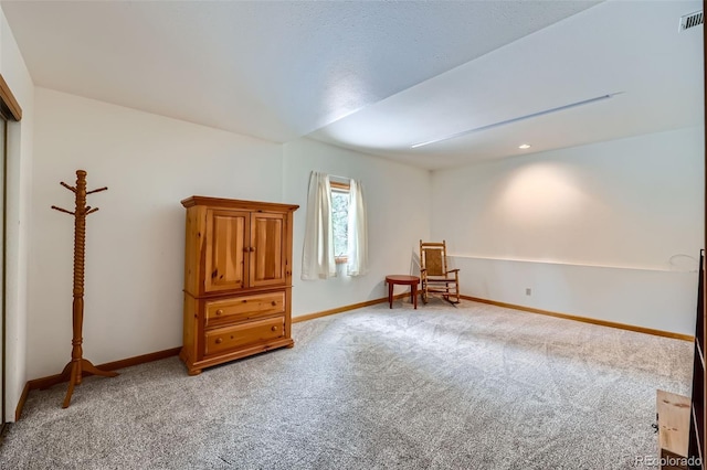 unfurnished room featuring carpet floors