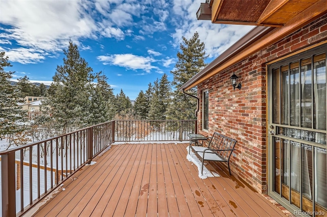 view of snow covered deck