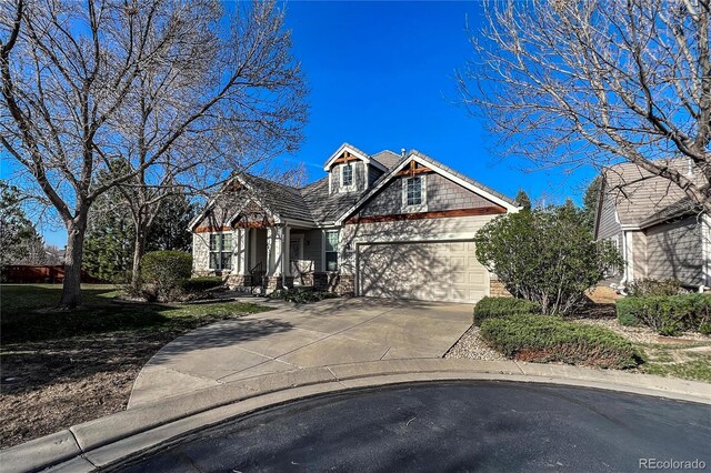 1430 Bluefield Ave, Longmont, CO 80504 - view of front facade with concrete driveway and a garage