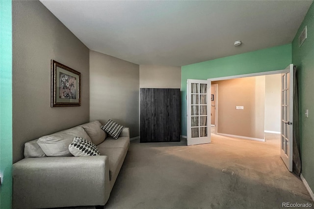 1430 Bluefield Ave, Longmont, CO 80504 - living room featuring visible vents, carpet flooring, baseboards, and french doors