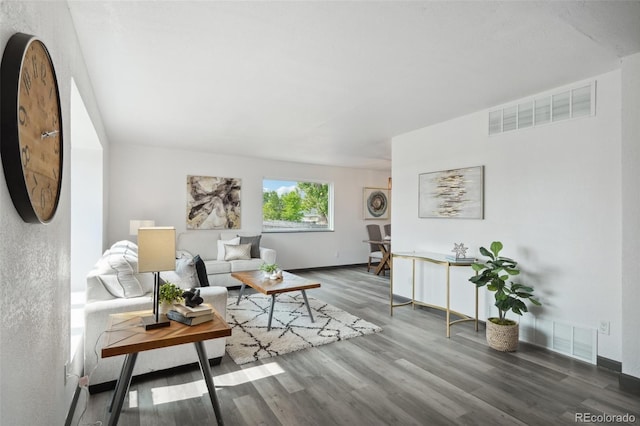 1973 Bahama St, Aurora, CO 80011 - living area with wood finished floors and baseboards