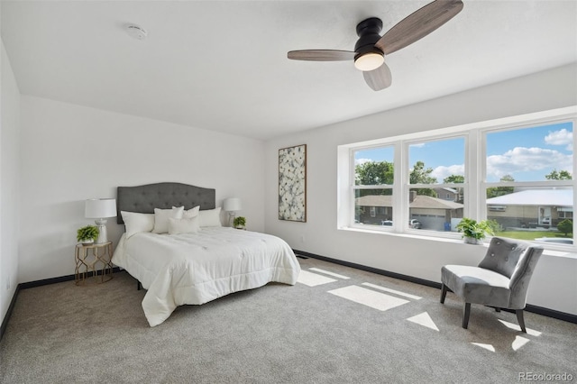 1973 Bahama St, Aurora, CO 80011 - carpeted bedroom with baseboards and ceiling fan