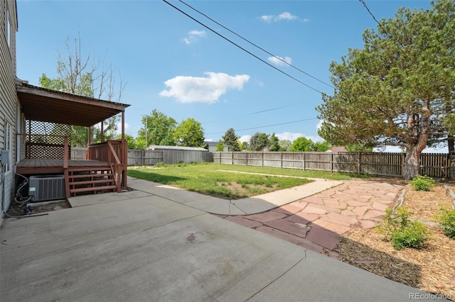 1973 Bahama St, Aurora, CO 80011 - view of patio with a deck and central AC unit