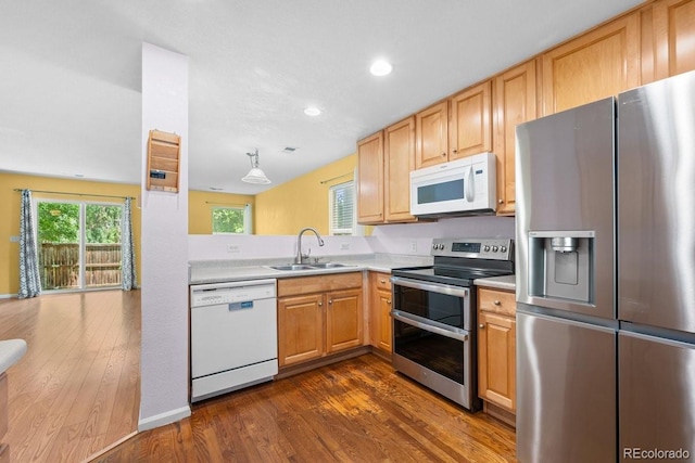 426 Plowman Way, Fort Collins, CO 80526 - kitchen featuring appliances with stainless steel finishes, light countertops, dark wood-style floors, recessed lighting, and light brown cabinets