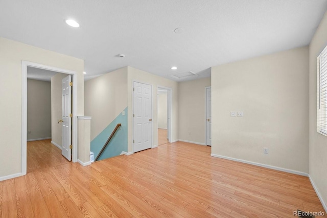 426 Plowman Way, Fort Collins, CO 80526 - empty room featuring light wood-style floors, recessed lighting, and healthy amount of natural light